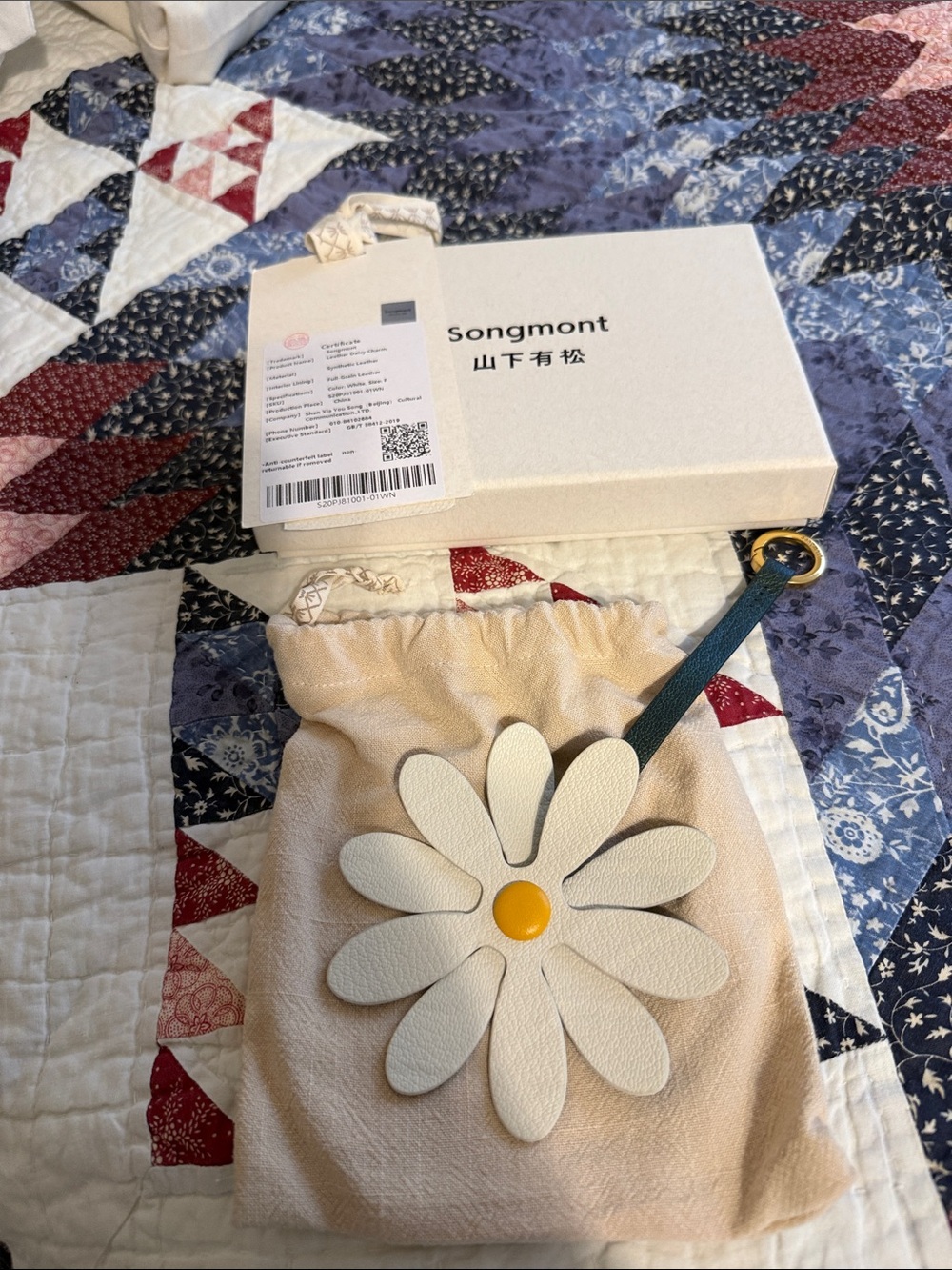 Songmont Cream Daisy Charm with Yellow Center and Teal Strap